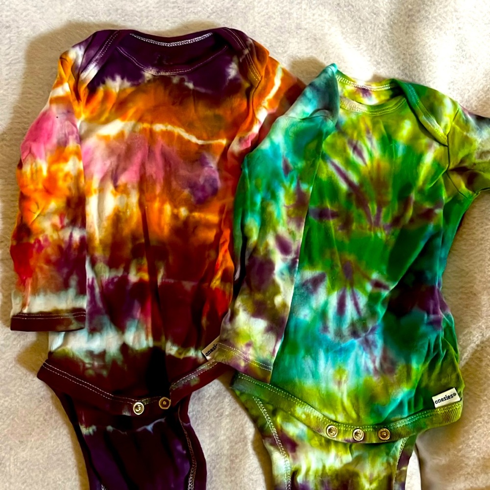 Set of 2, 6-9 month long sleeve tie-dyed onesies.